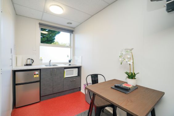 Tourist Flats kitchenette and dining table